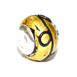 gold and black bead