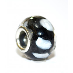 green black and white bead
