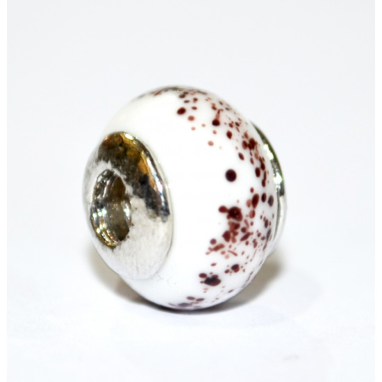 white and brown porcelain bead
